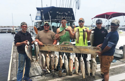Reeling in trophy Salmon catches in Oswego, NY!